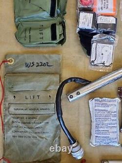 SPH-4 Flight Helmet Lot, Survival Vest, Survival Kit, Pilot Control Stick Grip