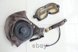 Used vintage pilot leather flight helmet, goggles, throat microphone